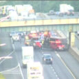 Box truck carrying vitamins overturned on I-95 in Milford Monday, police say