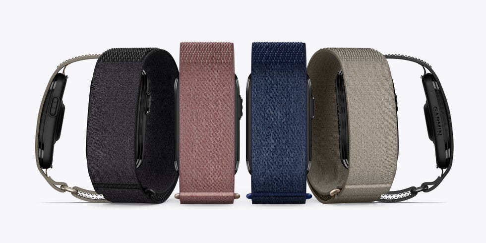 five smartwatches with fabric bands in black, pink, blue, and beige colors. five smartwatches with fabric bands in black, pink, blue, and beige colors.