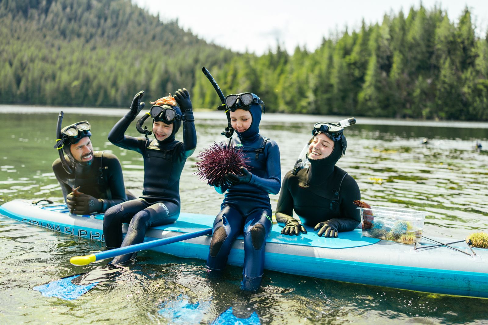 Image may contain Adult Person Water Outdoors Nature Child Face and Head