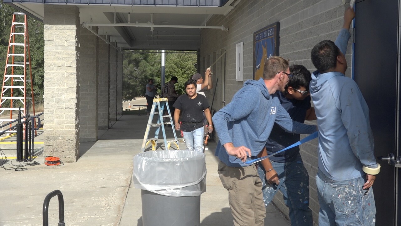 Construction crew puts on the finishing touches