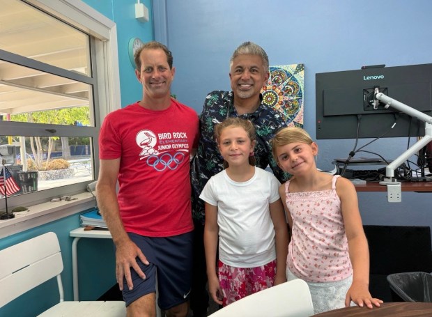 Bird Rock Elementary School physical education teacher Ryan Weiss, principal Eric Banatao and second graders Layla DiCerbo and Calli Bazilian are part of the school's Wellness Committee. (Wendy Bazilian)